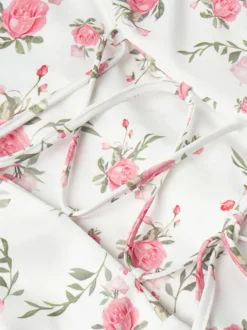 Robe courte à imprimé floral manches bouffantes col Claudine et lacets dans le dos été 2026