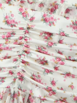 Robe courte à imprimé floral rose col en V manches longues été 2026