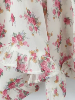 Robe courte à imprimé floral rose col en V manches longues été 2026