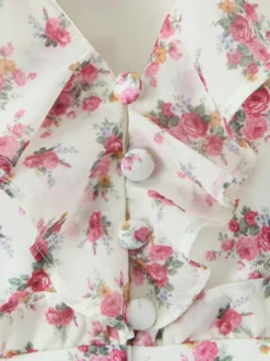 Robe courte à imprimé floral rose col en V manches longues été 2026