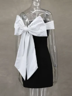 Robe courte à épaules dénudées avec nœud dans le dos coupe trapèze idéale pour une fête d'anniversaire ou un cocktail 2026