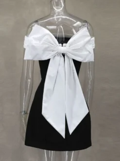 Robe courte à épaules dénudées avec nœud dans le dos coupe trapèze idéale pour une fête d'anniversaire ou un cocktail 2026