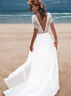 Robe de mariée bohème col V manche longue en dentelle à petite traîne
