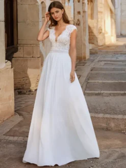 Robe de mariée bohème en dentelle robe de bal longueur au sol taille naturelle dos nu sans manches col en V ivoire