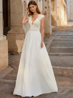 Robe de mariée bohème en dentelle robe de bal longueur au sol taille naturelle dos nu sans manches col en V ivoire