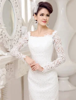 Robe de mariée courte col bateau manche longue zip sur dos en dentelle