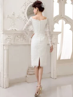Robe de mariée courte col bateau manche longue zip sur dos en dentelle