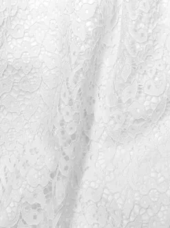 Robe de mariée courte en dentelle décolleté en V longueur genou boutons fonctionnels manches courtes ivoire