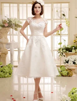 Robe de mariée courte en organza manche courte laçage sur dos longueur au genou Robe de mariage