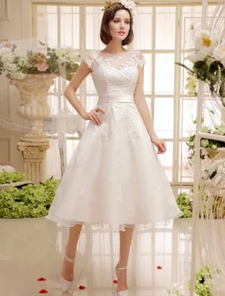 Robe de mariée courte en organza manche courte laçage sur dos longueur au genou Robe de mariage