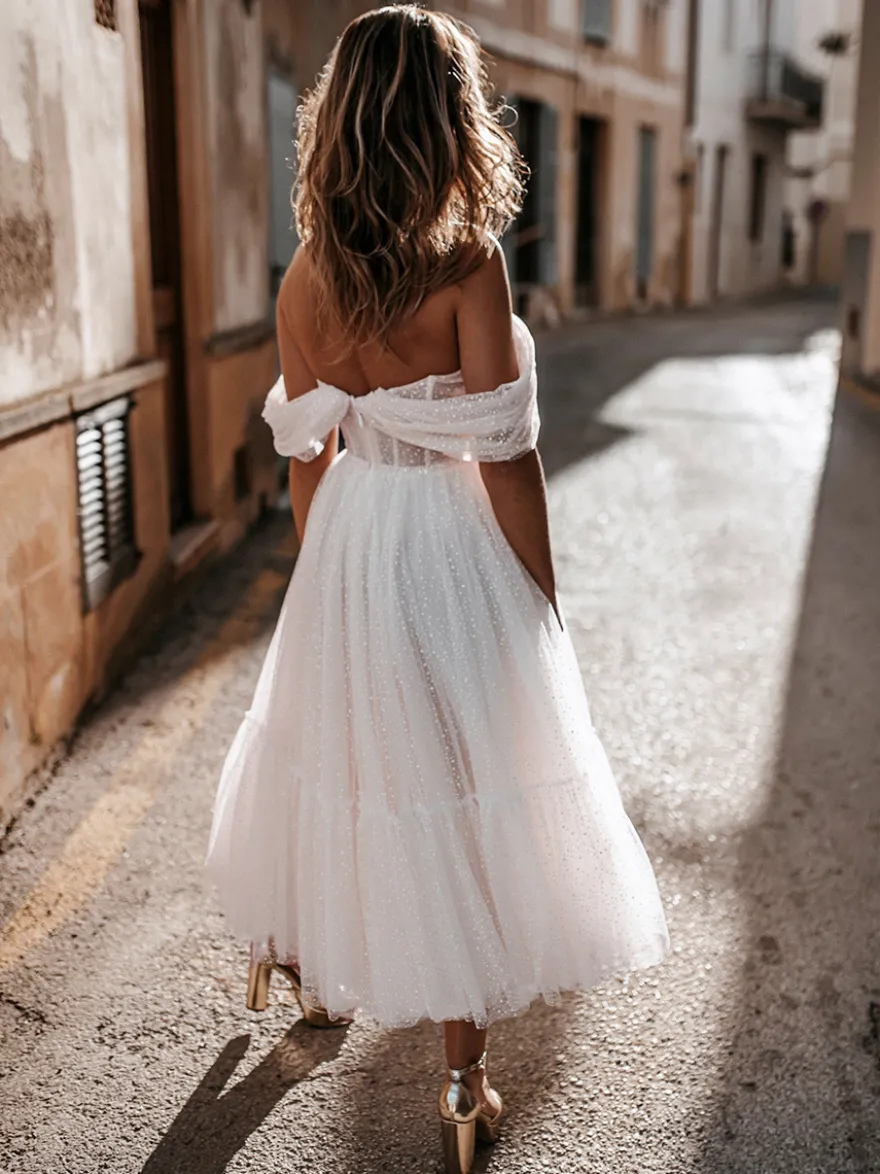Robe de mariée courte en tulle paillete hors de l'épaule zip sur dos