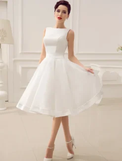 Robe de mariée courte robe mariage vintage col bateau noeud sur dos au genou