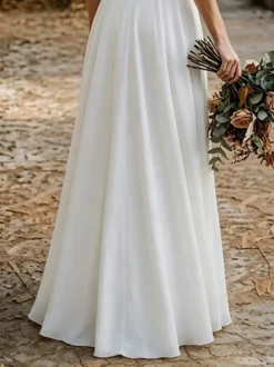 Robe de mariée deux pièces en crêpe stretch col rond longueur au sol fermeture éclair manches courtes