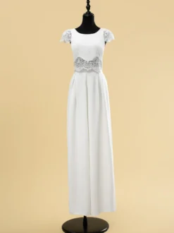 Robe de mariée deux pièces en dentelle découpée avec col bijou deux pièces longueur au sol fermeture éclair manches courtes longueur au sol ivoire