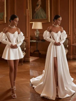 Robe de mariée deux pièces en satin décolleté travaillé coupe trapèze avec traîne fermeture éclair manches 3/4 longues