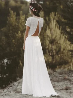 Robe de mariée deux pièces ivoire haut en dentelle col rond manche courte jupe en mousseline de soie