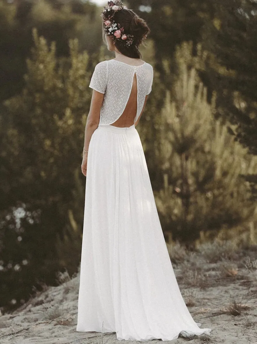 Robe de mariée deux pièces ivoire haut en dentelle col rond manche courte jupe en mousseline de soie
