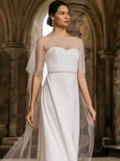 Robe de mariée en tulle ivoire à col rond et manches courtes