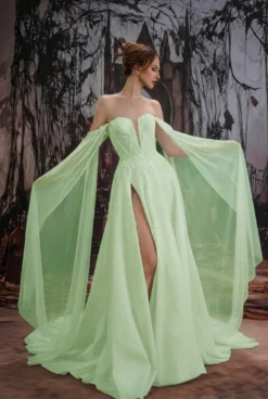 Robe de mariée gothique noire en dentelle coupe trapèze manches longues taille naturelle à volants et traîne