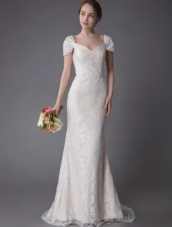 Robe de mariée ivoire en dentelle col en coeur manche courte zip sur dos Robe de mariage