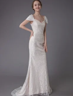 Robe de mariée ivoire en dentelle col en coeur manche courte zip sur dos Robe de mariage