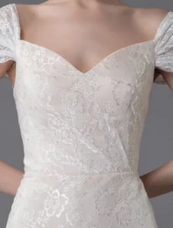 Robe de mariée ivoire en dentelle col en coeur manche courte zip sur dos Robe de mariage