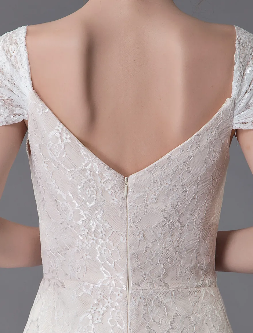Robe de mariée ivoire en dentelle col en coeur manche courte zip sur dos Robe de mariage