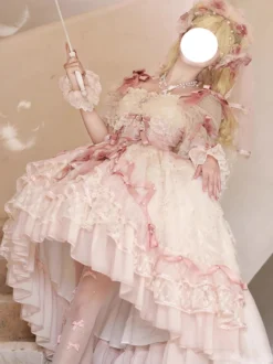 Robe de mariée Lolita rose style ballet ornée de nœuds et de volants avec traîne.