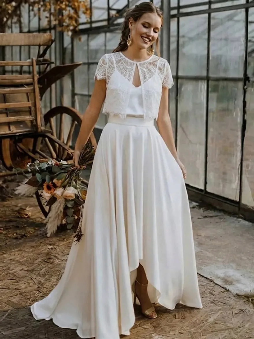 Robe de mariée 3 pièces en dentelle col bijou coupe trapèze fermeture éclair manches courtes