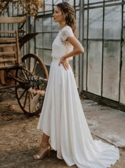 Robe de mariée 3 pièces en dentelle col bijou coupe trapèze fermeture éclair manches courtes