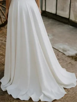 Robe de mariée 3 pièces en dentelle col bijou coupe trapèze fermeture éclair manches courtes