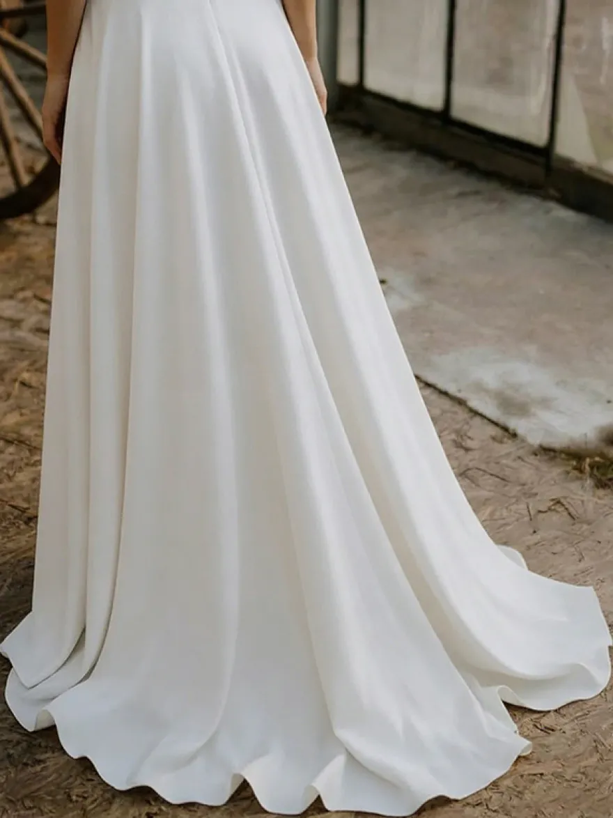 Robe de mariée 3 pièces en dentelle col bijou coupe trapèze fermeture éclair manches courtes