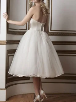 Robe de mariée robe de mariage courte bustier boutonné sur dos