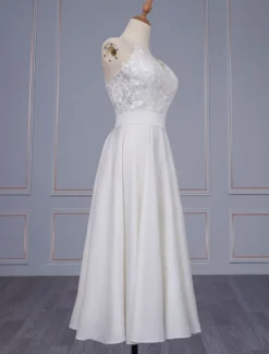 Robe de mariée simple à bretelle zip ou laçage sur dos jupe plissé robe de mariage