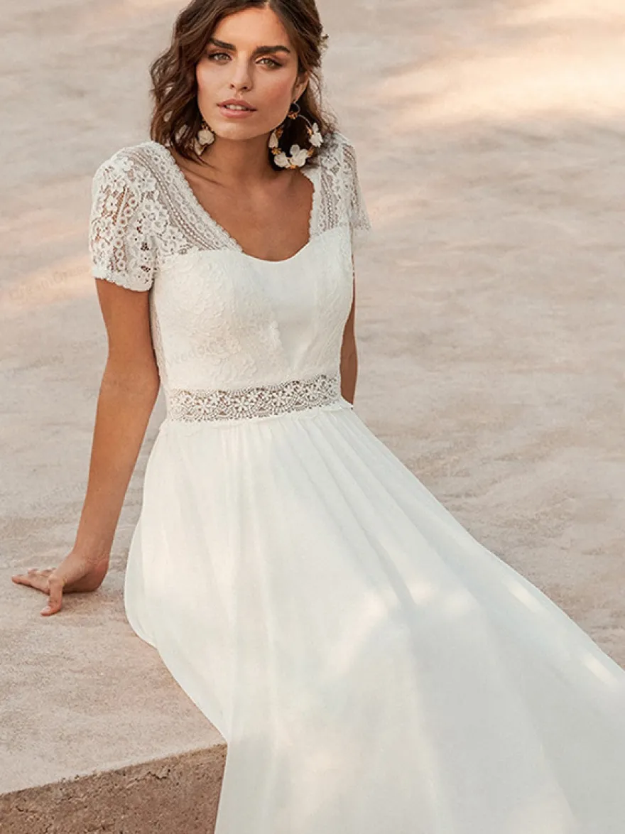 Robe de mariée simple robe de bal décolleté travaillé manches courtes robe de mariée en dentelle