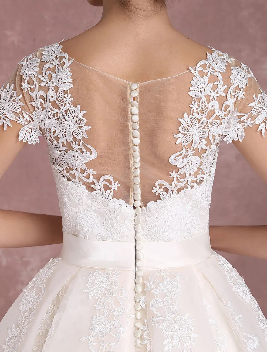 Robe de mariée vintage courte col rond manche courte boutonné sur dos