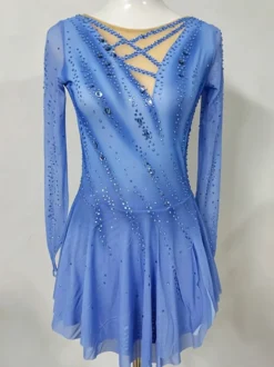 Robe de patinage artistique pour femmes et filles bleue très élastique idéale pour l'entraînement et la compétition. Style classique ornée de cristaux et de strass manches longues.