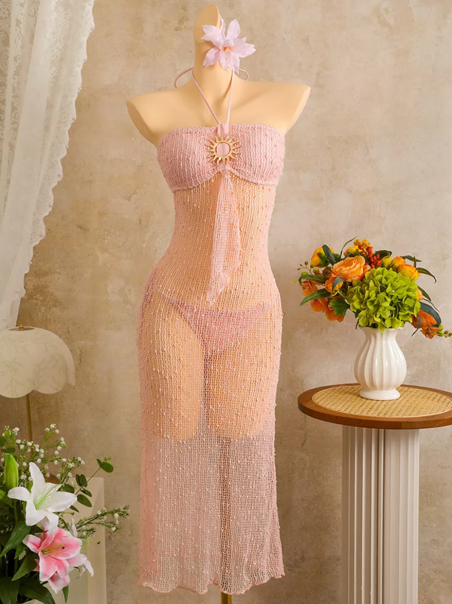 Robe de plage midi dos nu à boutons soleil en maille ajourée transparente