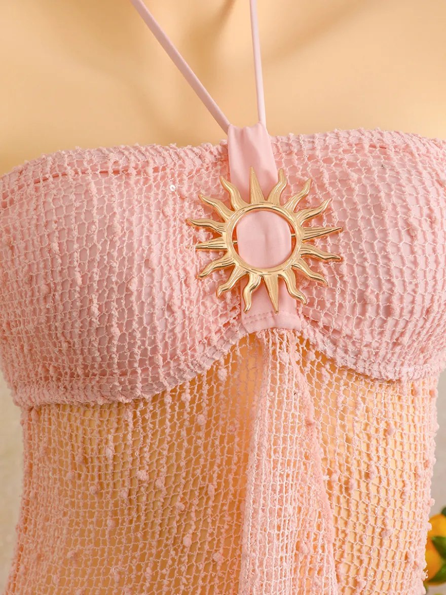 Robe de plage midi dos nu à boutons soleil en maille ajourée transparente