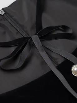 Robe de soirée chic bicolore noire à volants mini-robe deux-pièces à manches longues.