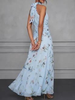 Robe de soirée longue en mousseline de soie à imprimé floral dos nu et taille froncée style licou pour une invitée de mariage