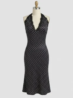 Robe de soirée midi noire à pois dos nu sans manches style semi-formel idéale pour l'été.
