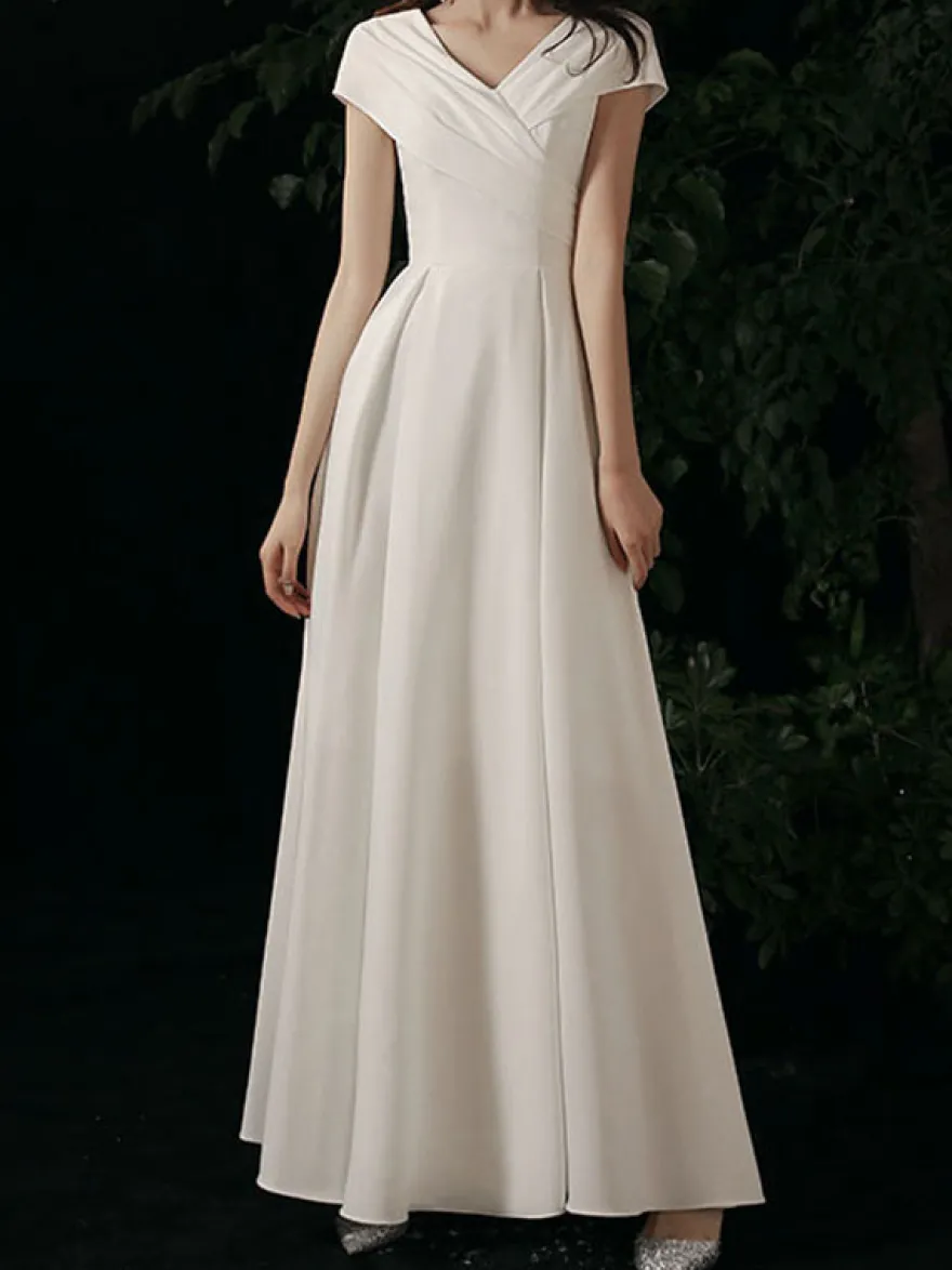 Robe de soirée trapèze col en V tissu satiné longueur au sol
