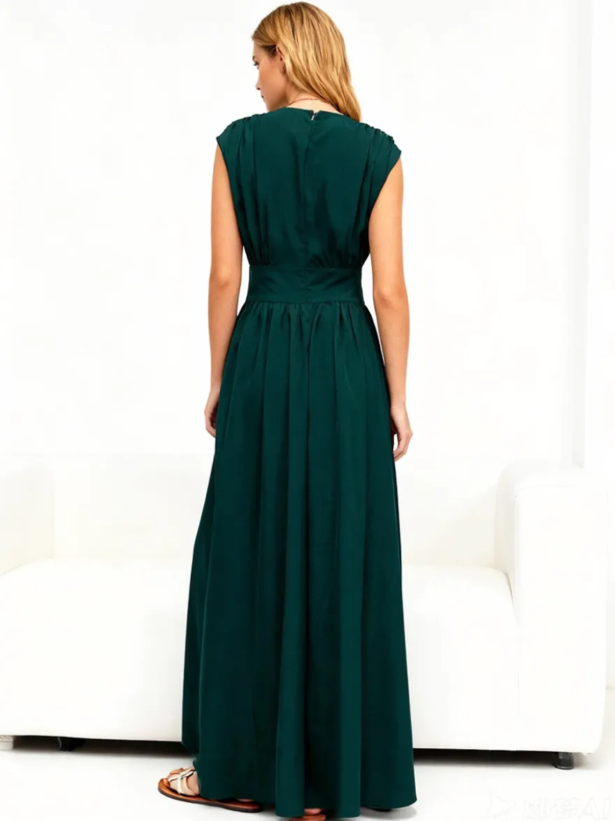 Robe de soirée vert émeraude cintrée et élégante avec jupe plissée parfaite pour les événements formels.