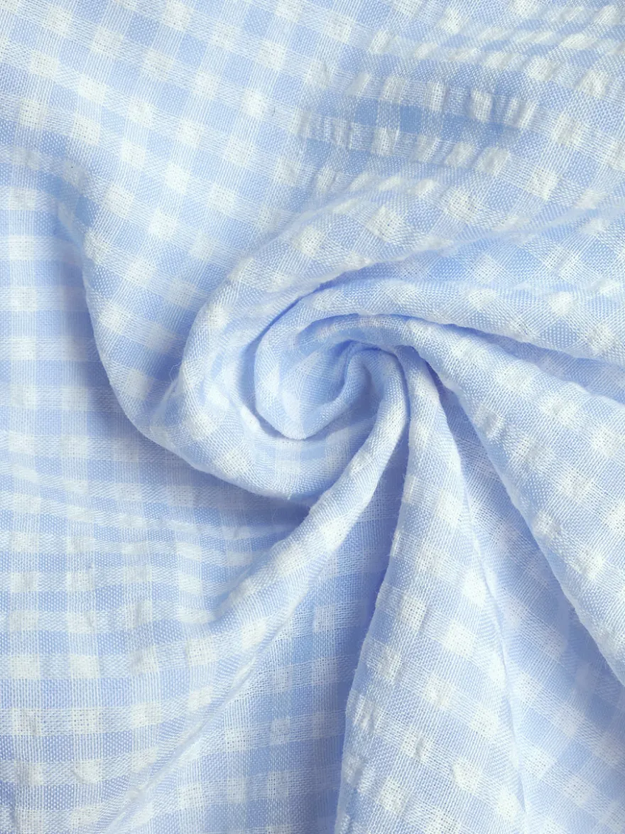 Robe d'été bleue mini à lacets sans manches et dos nu longueur genou idéale pour une soirée en amoureux
