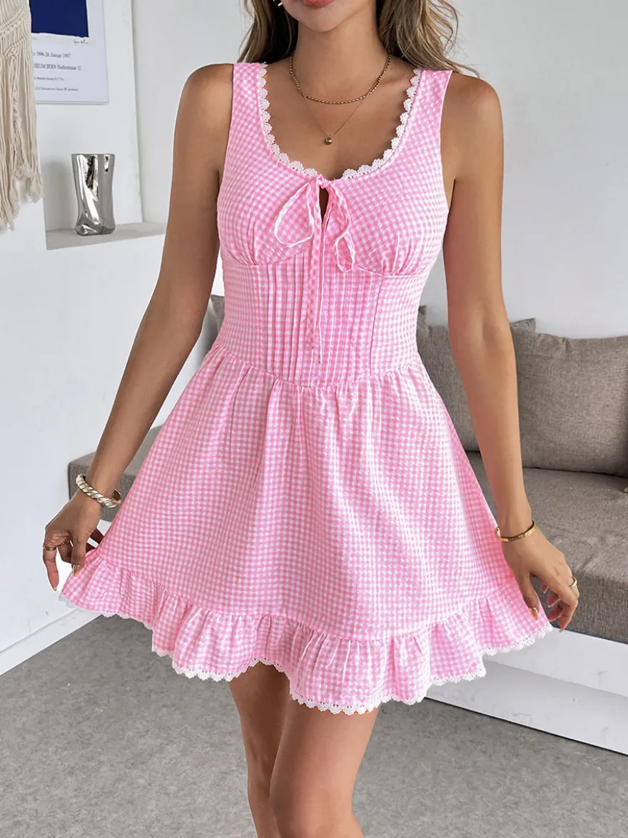 Robe d'été bleue mini à lacets sans manches et dos nu longueur genou idéale pour une soirée en amoureux