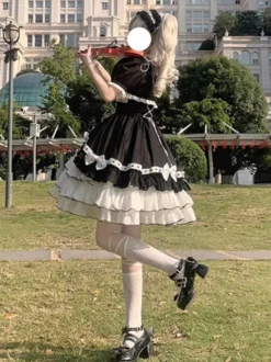 Robe Lolita JSK de retour à l'école et ensemble de pièces de remorquage à smocks à volants multicouches avec nœud papillon Robe Lolita JSK de princesse douce