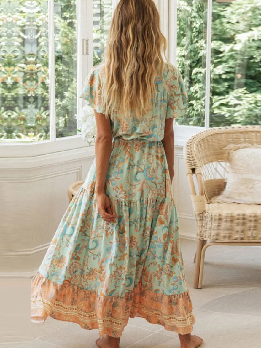 Robe longue bohème à fleurs pour femme - Robe trapèze à col V et manches papillon à volants - Idéale pour une fête d'été sur la plage 2026