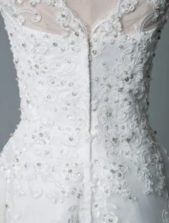 Robe mariée courte col rond en dentelle pailletes jupe en tulle zip sur dos Robe de mariage