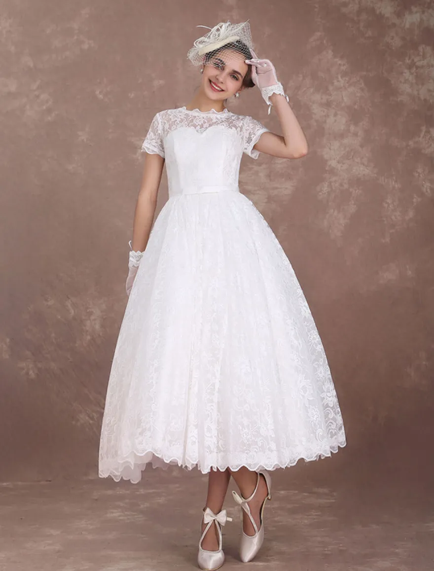 Robe mariée vintage manche courte en dentelle longueur au-dessous de genou doublure en satin boutonné sur dos robe de mariée ivoire